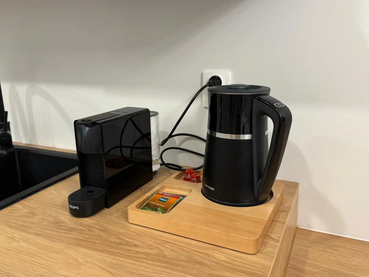 Coffee machine and kettle on the counter